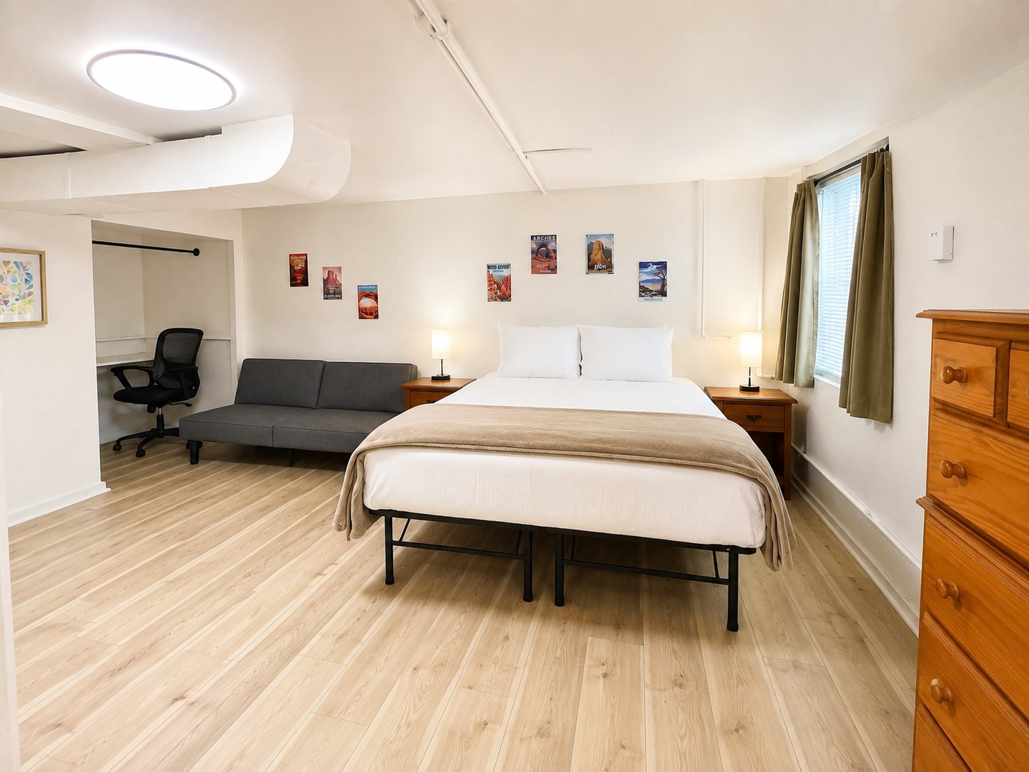 Bright Basement Basecamp bedroom and living space