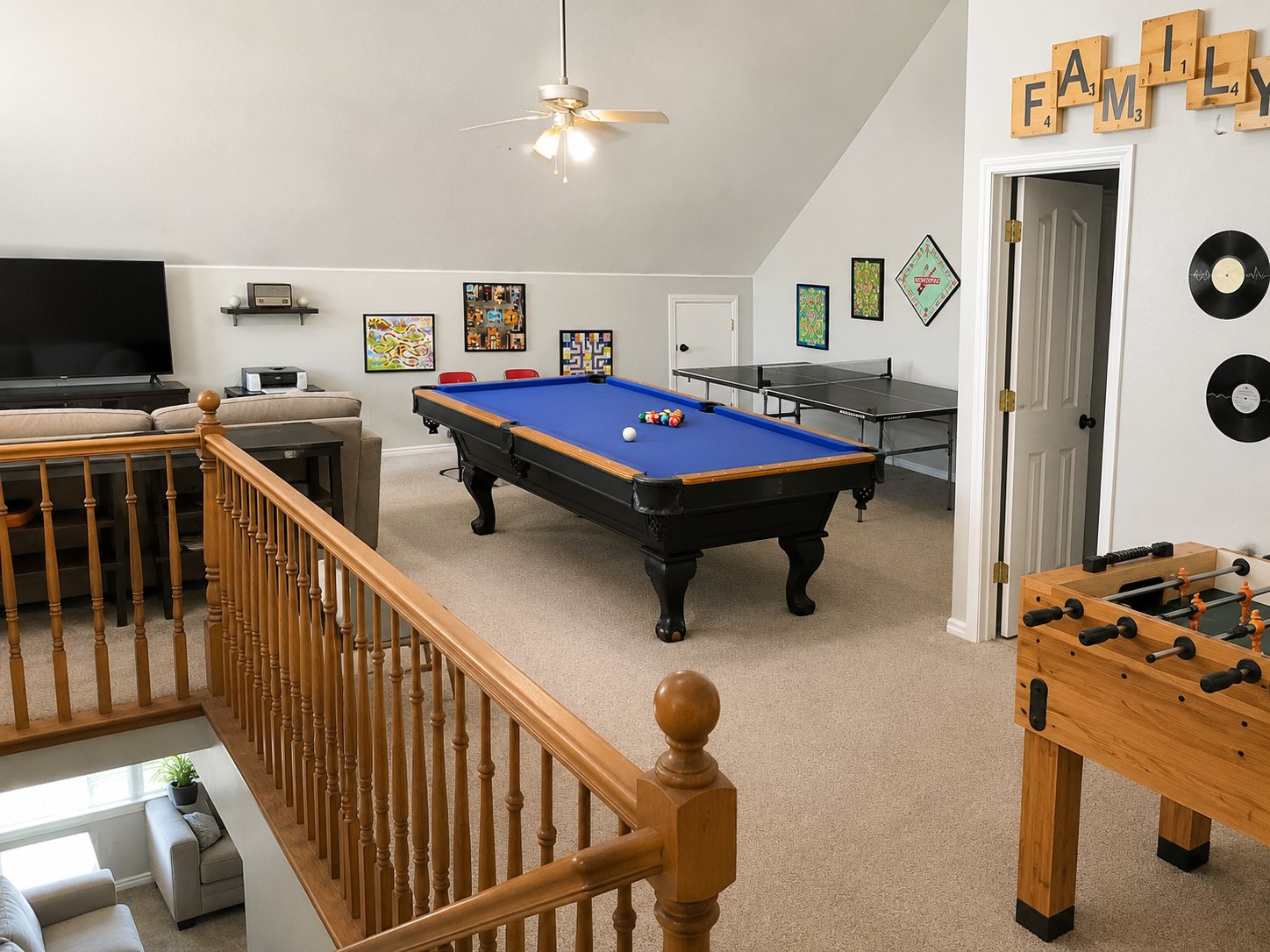 The Good Life game room with pool table and games